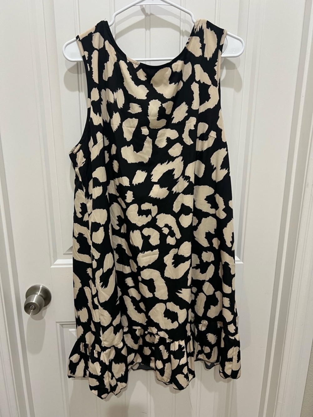 Sleeveless Black and Cream Animal Print Swing Dress - Picture 1 of 5